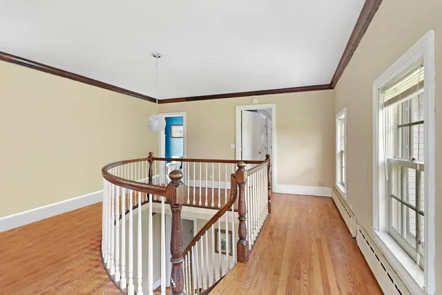 a view of entryway with wooden floor