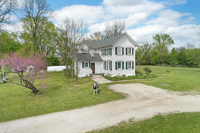 a house view with a garden space