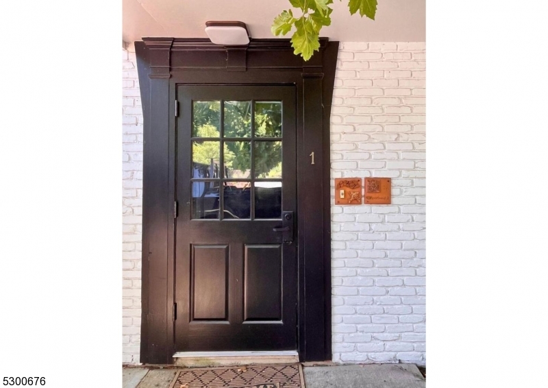 1 North Main Street, Unit 2 Stockton, NJ 08559 - Photo 1 of 12 a hallway with a door