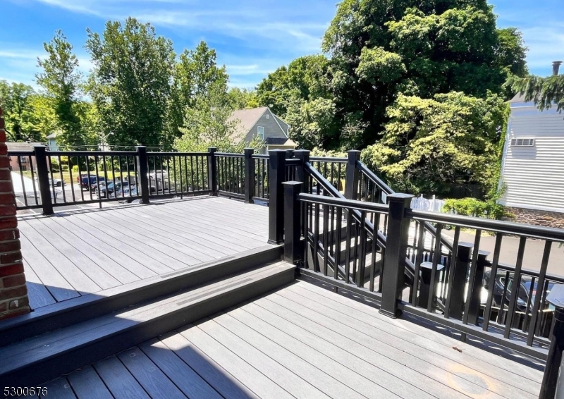 1 North Main Street, Unit 2 Stockton, NJ 08559 - Photo 2 of 12 a view of balcony and wooden floor