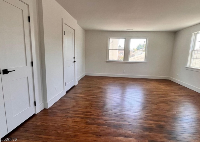 1 North Main Street, Unit 2 Stockton, NJ 08559 - Photo 5 of 12 a view of a room with wooden floor and window