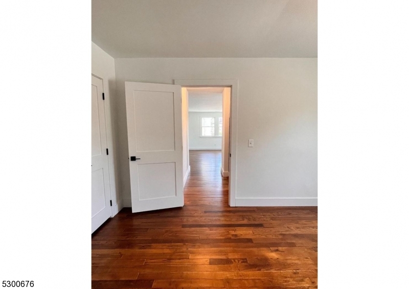1 North Main Street, Unit 2 Stockton, NJ 08559 - Photo 6 of 12 a view of an empty room with wooden floor