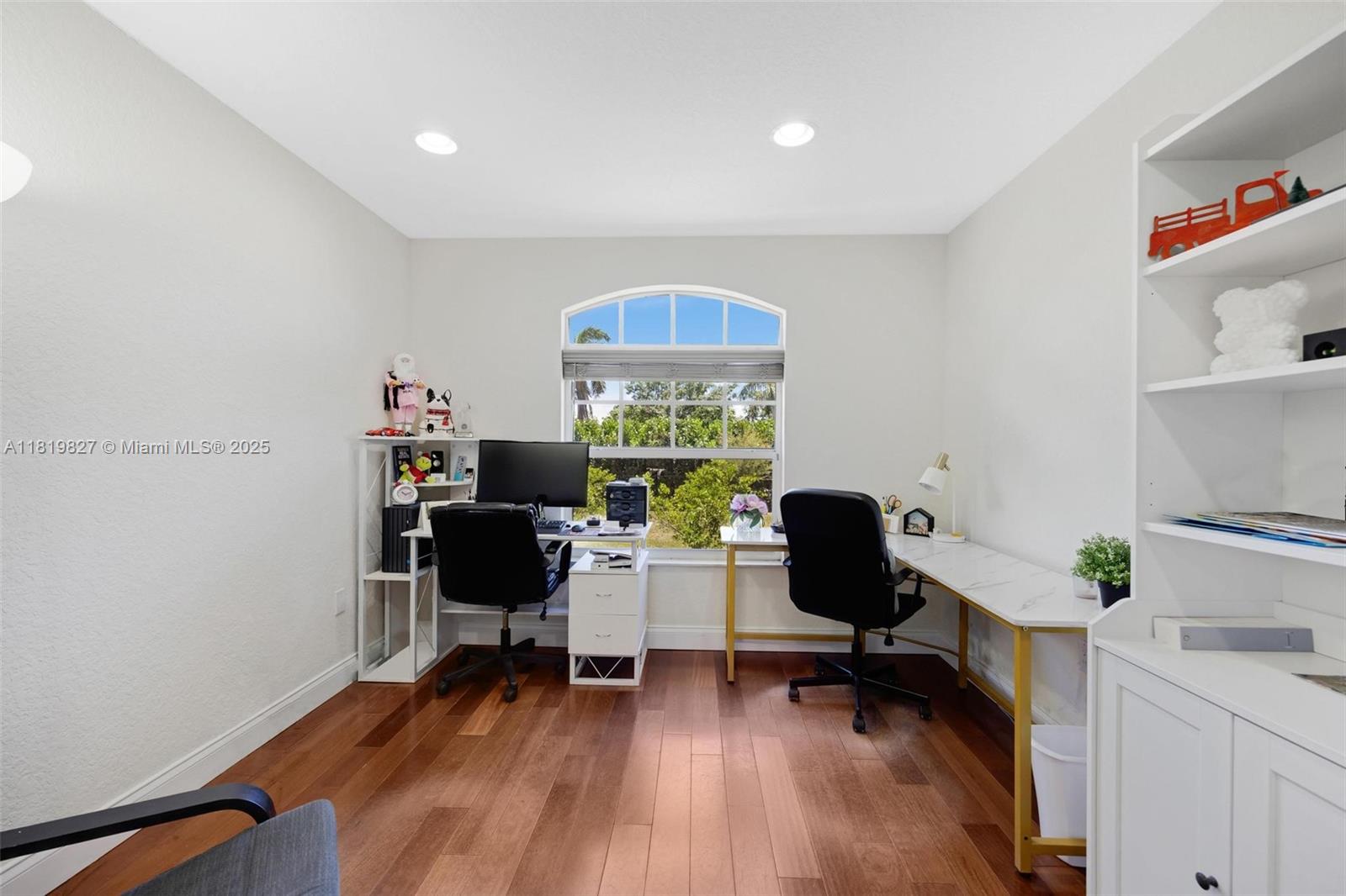 12851 Luray Road Southwest Ranches, FL 33330 - Photo 22 of 58 a view of a workspace with furniture and a window
