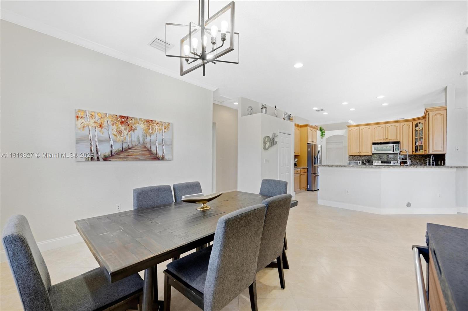 12851 Luray Road Southwest Ranches, FL 33330 - Photo 6 of 58 a view of a dining room with furniture and wooden floor