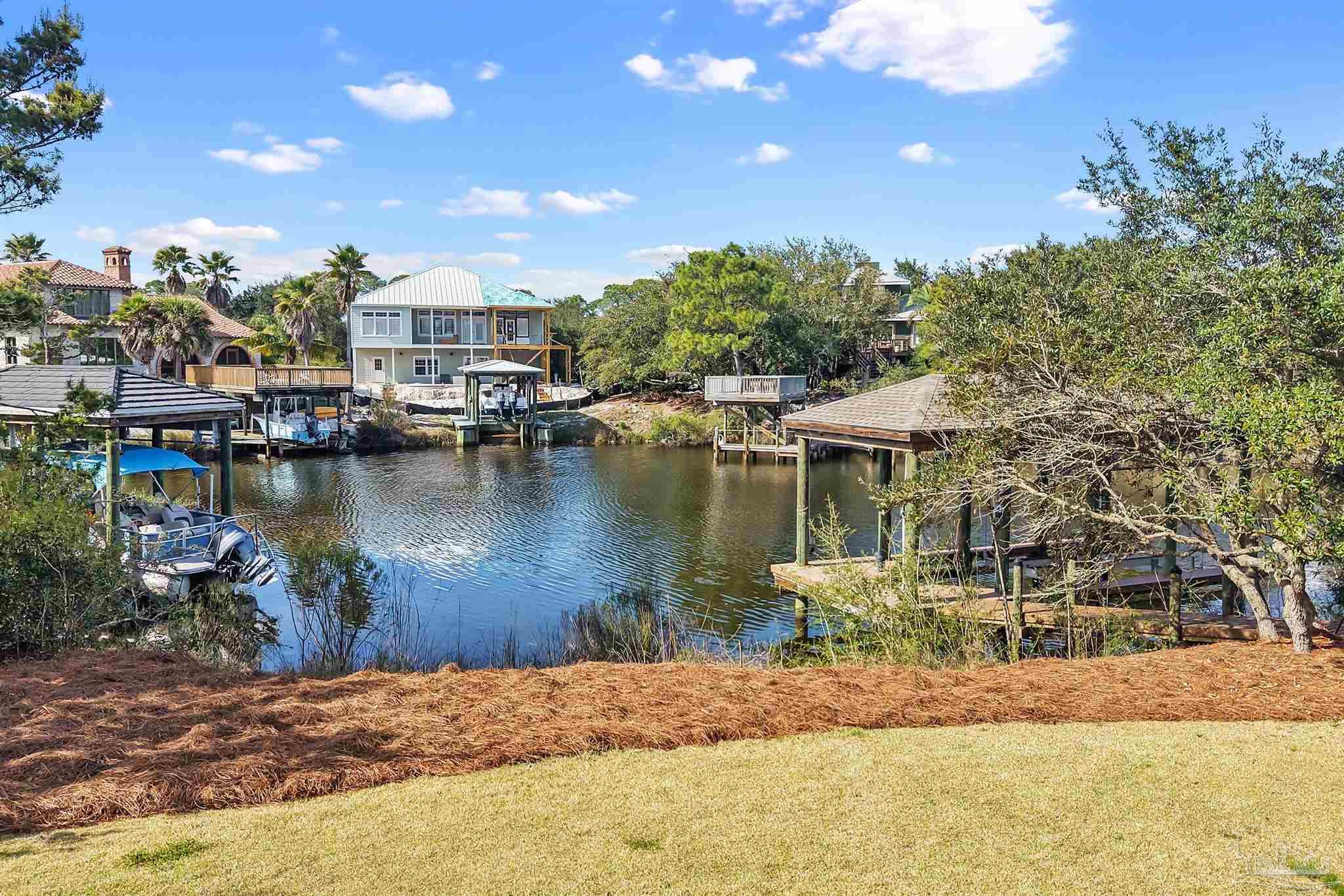 31729 River Road Orange Beach, AL 36561 - Photo 47 of 57 a view of a lake with houses