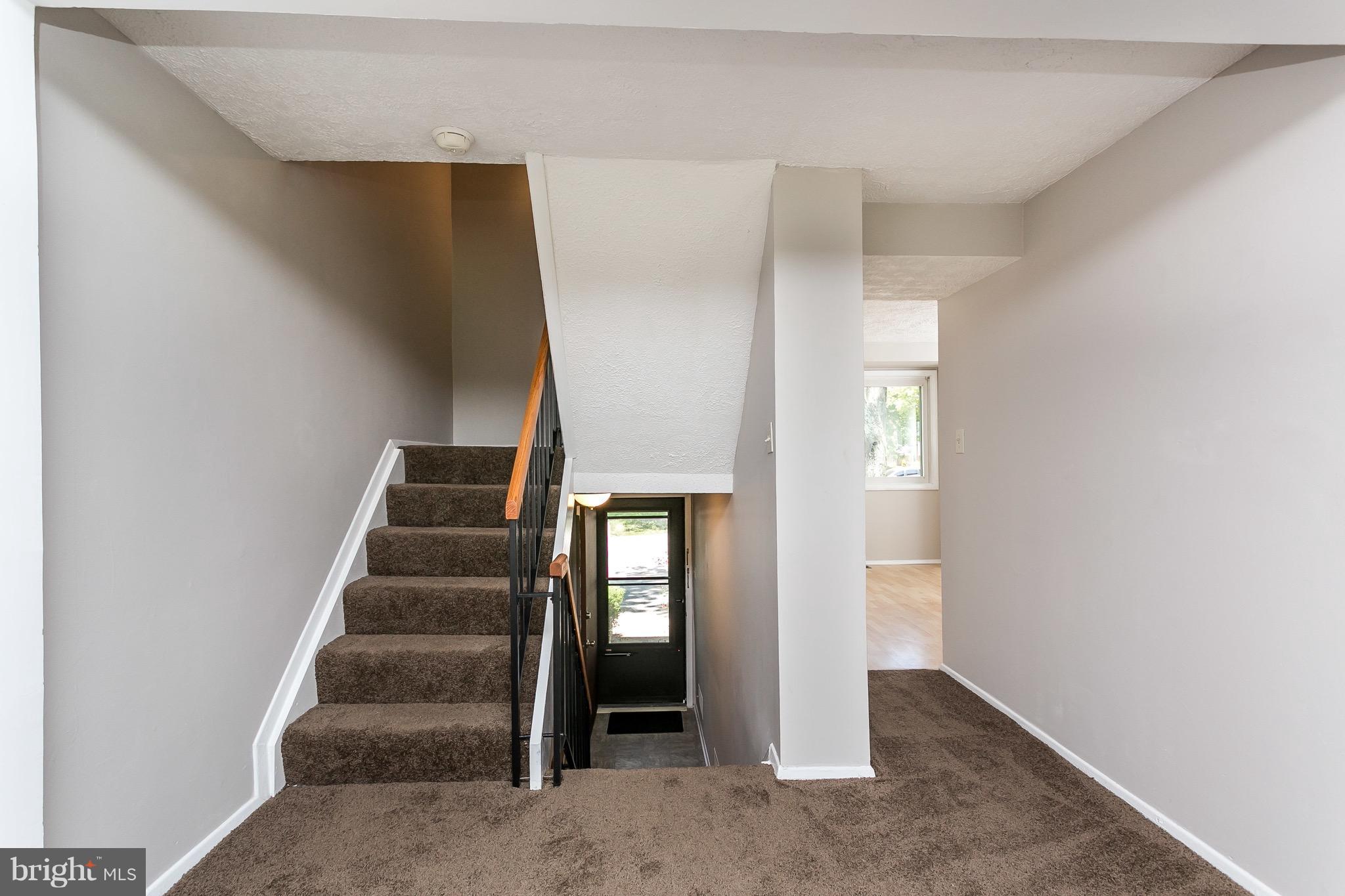 9408 Merryrest Road Columbia, MD 21045 - Photo 2 of 30 an entryway with a white walls