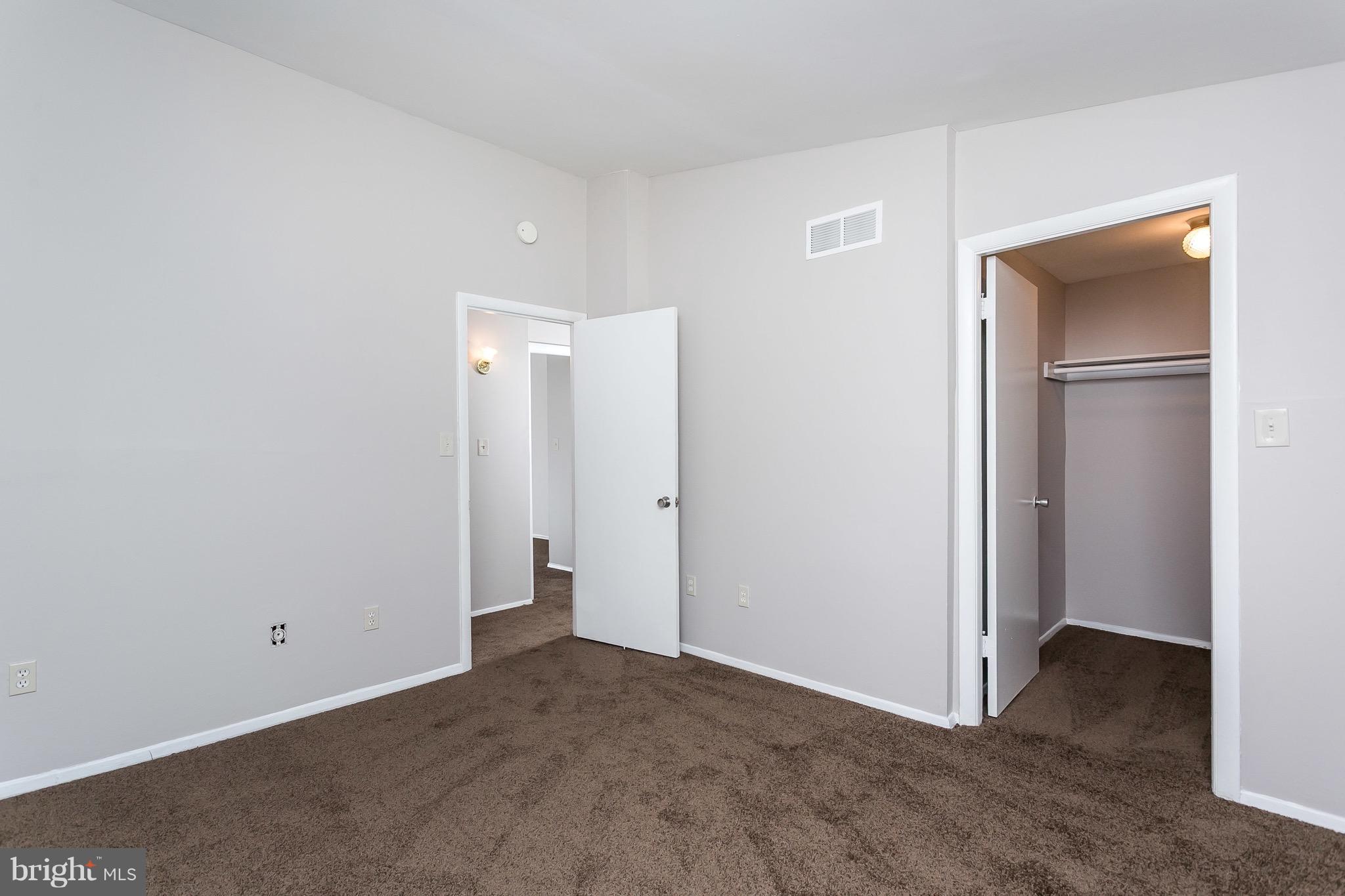 9408 Merryrest Road Columbia, MD 21045 - Photo 13 of 30 a view of an empty room with closet and a bathroom