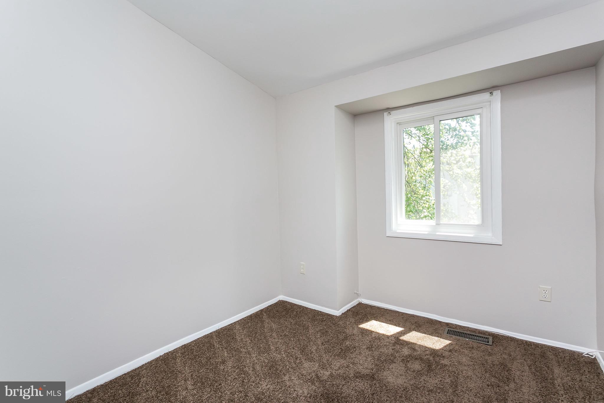 9408 Merryrest Road Columbia, MD 21045 - Photo 17 of 30 an empty room with a window