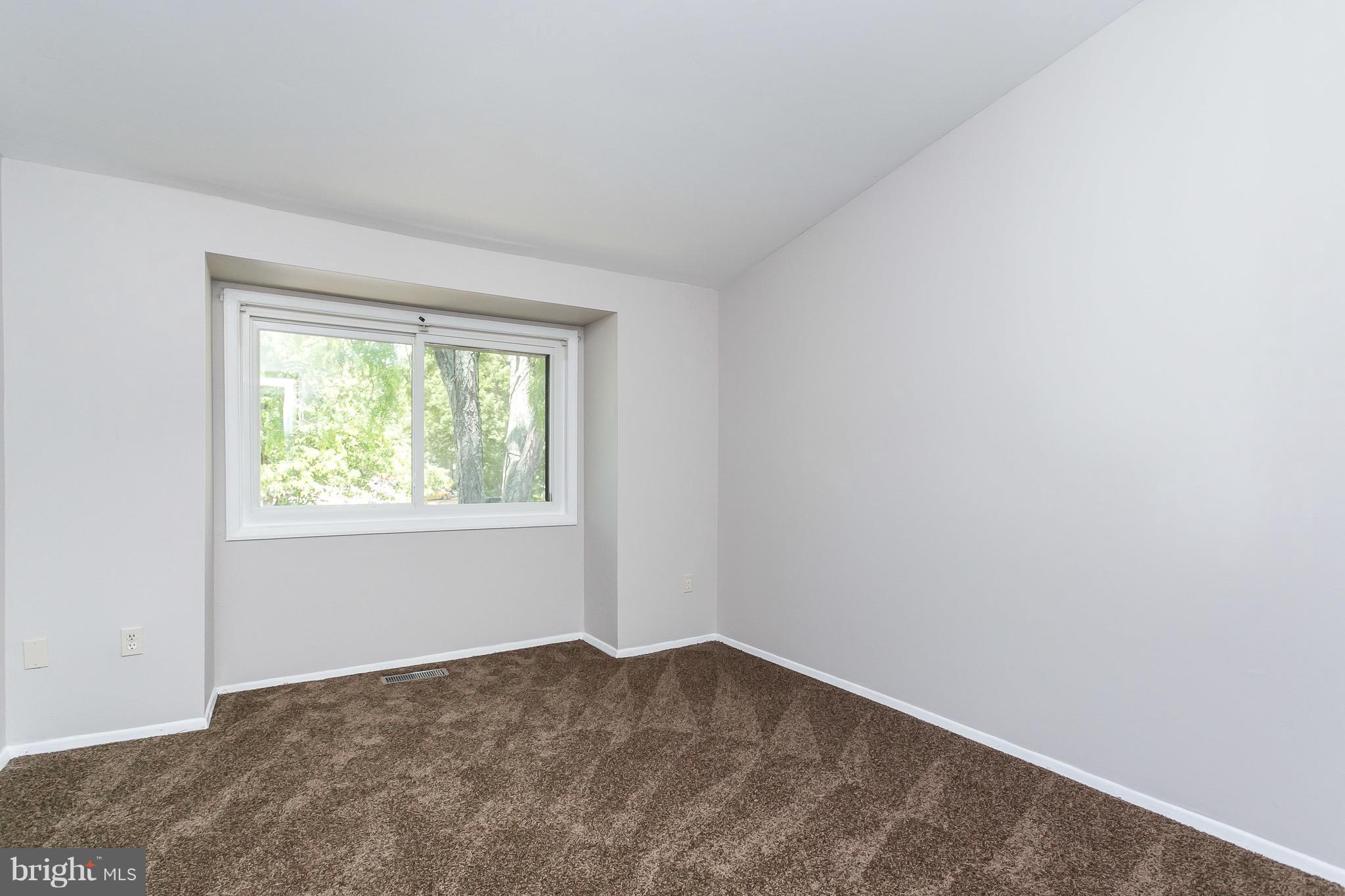 9408 Merryrest Road Columbia, MD 21045 - Photo 19 of 30 an empty room with a window
