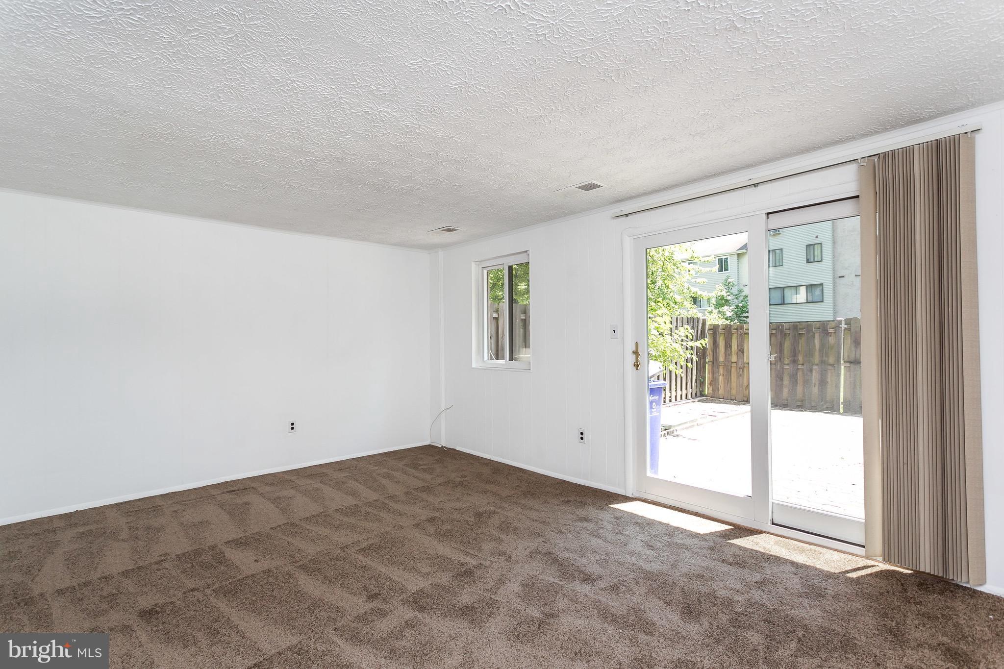 9408 Merryrest Road Columbia, MD 21045 - Photo 22 of 30 a view of an empty room with a window