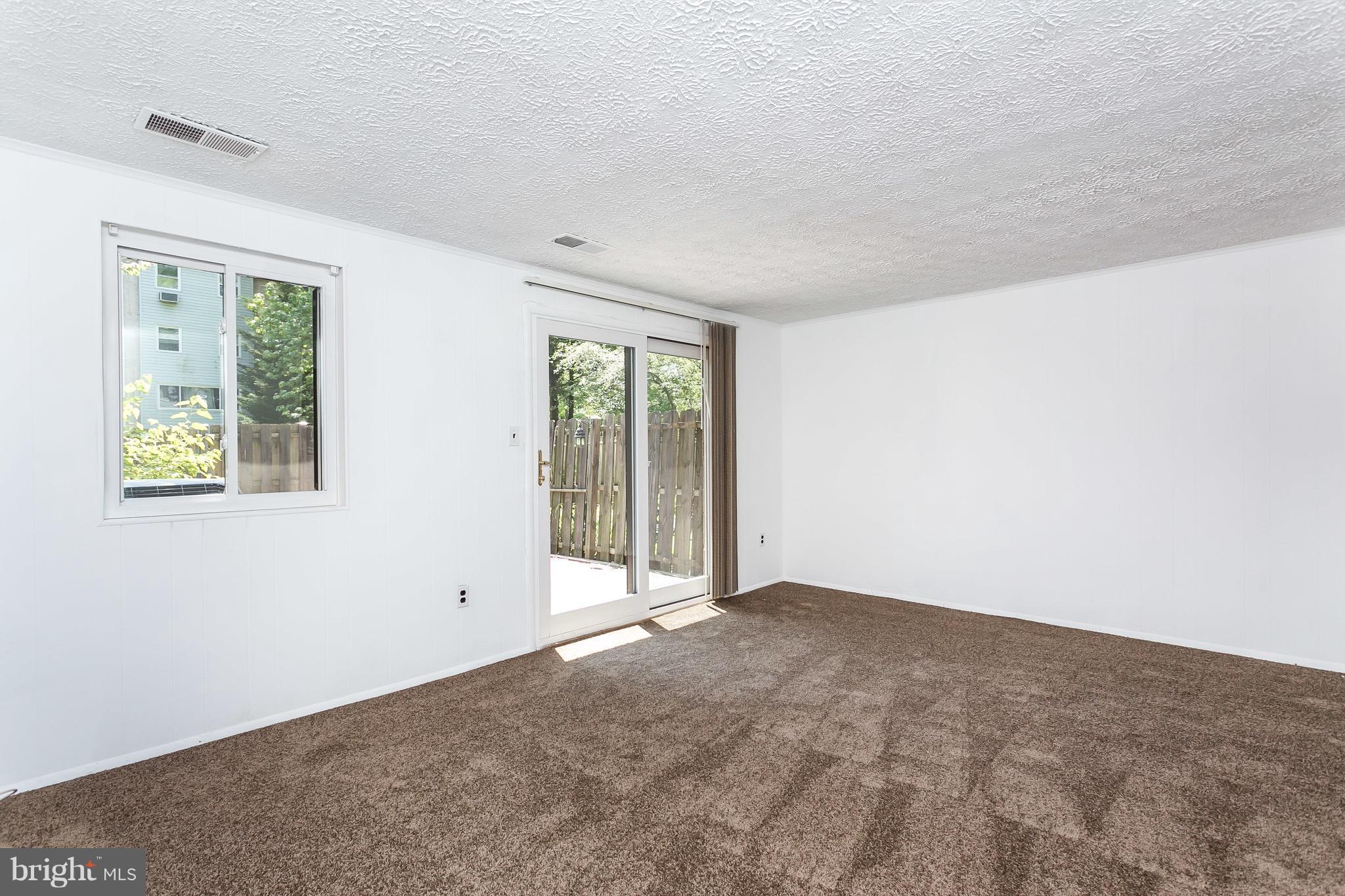 9408 Merryrest Road Columbia, MD 21045 - Photo 23 of 30 an empty room with windows