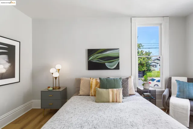 a bedroom with furniture and a bed