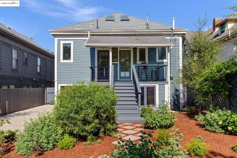 a view of a patio with a table and chairs