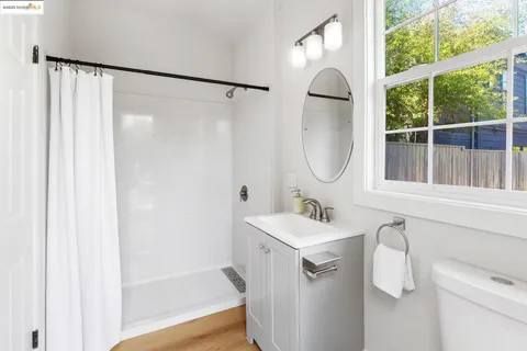 a backyard of a house with yard fire pit and outdoor seating