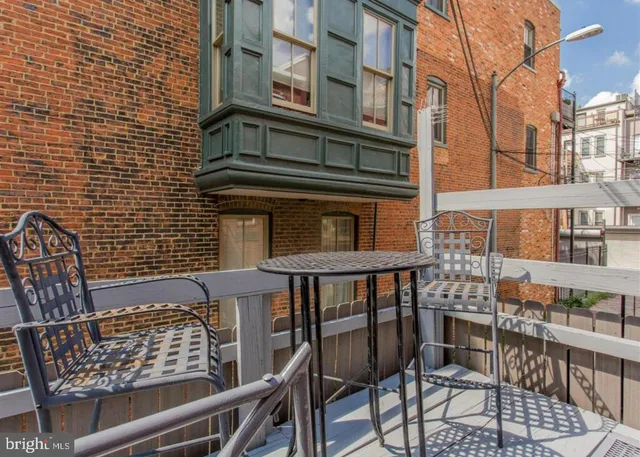 front view of a building with street view