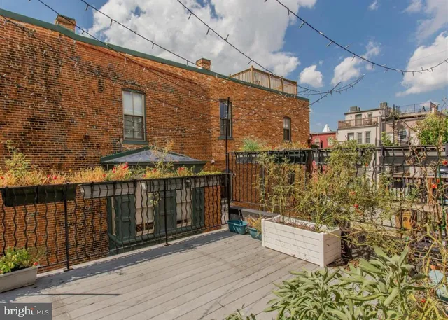 a view of a balcony with an outdoor space