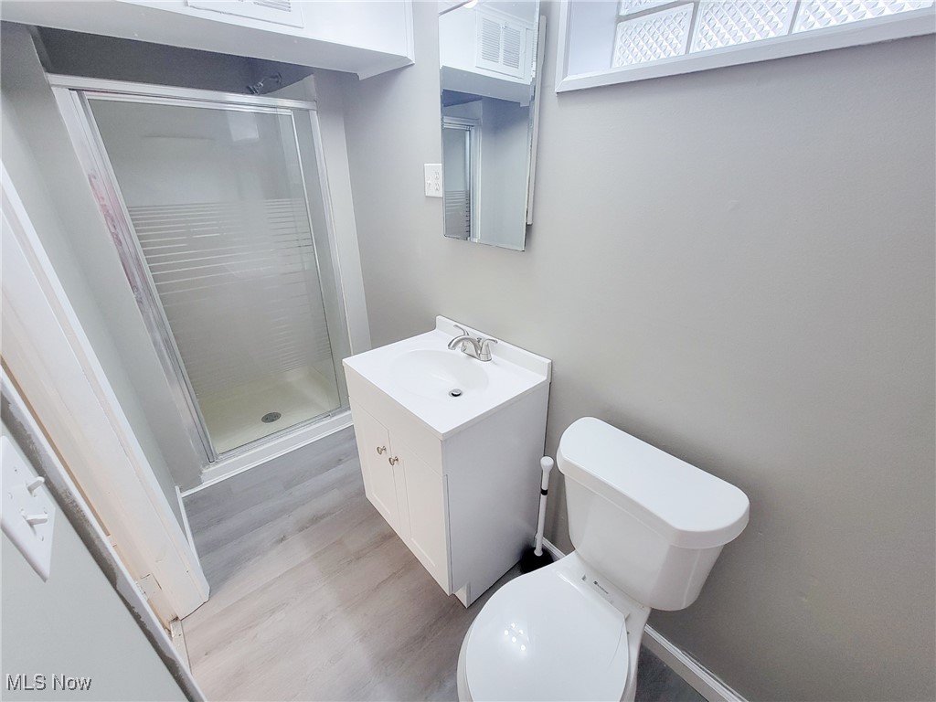4160 Patton Road Cleveland, OH 44109 - Photo 16 of 20 full bathroom with a stand alone shower in the basement next to the laundry room.