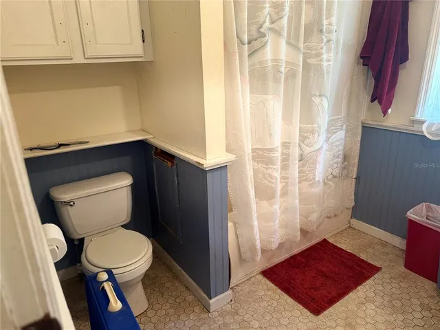 a front view of a house with a glass door