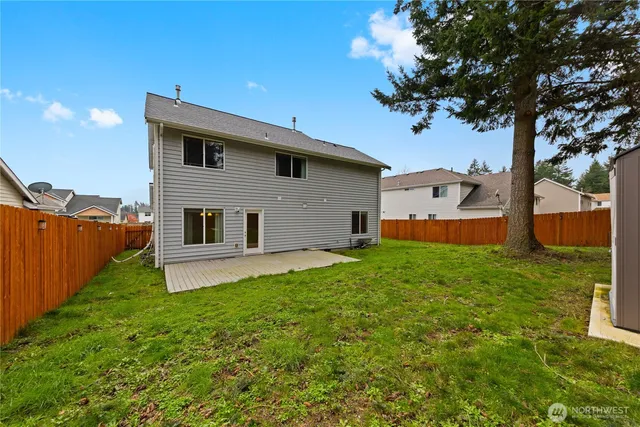 a house view with a garden space