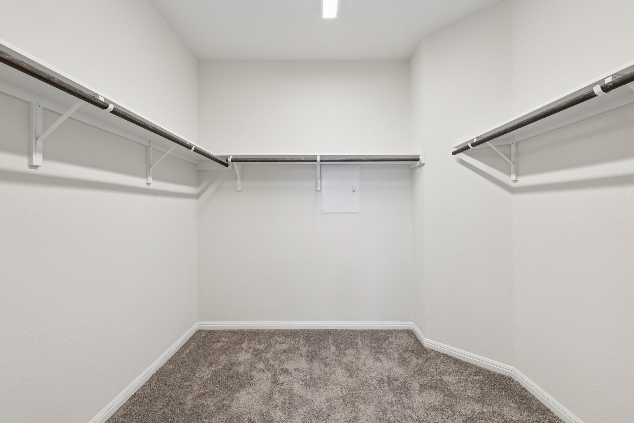 308 Castlefields Street Hutto, TX 78634 - Photo 19 of 31 a view of an empty walk in closet