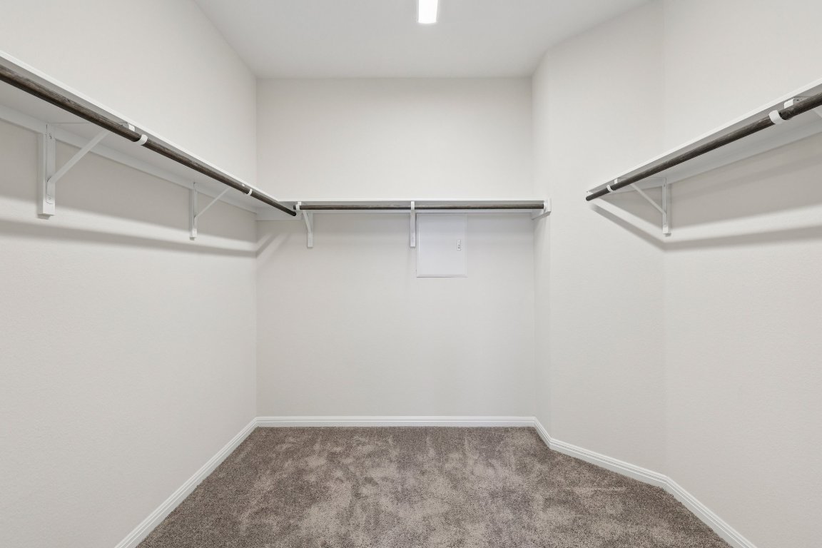 308 Castlefields Street Hutto, TX 78634 - Photo 19 of 31 a view of an empty walk in closet