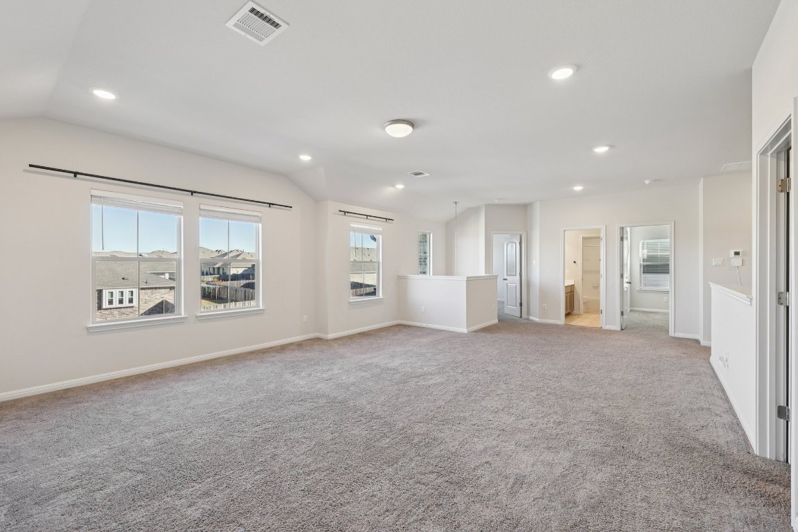 308 Castlefields Street Hutto, TX 78634 - Photo 20 of 31 a view of an empty room with a window