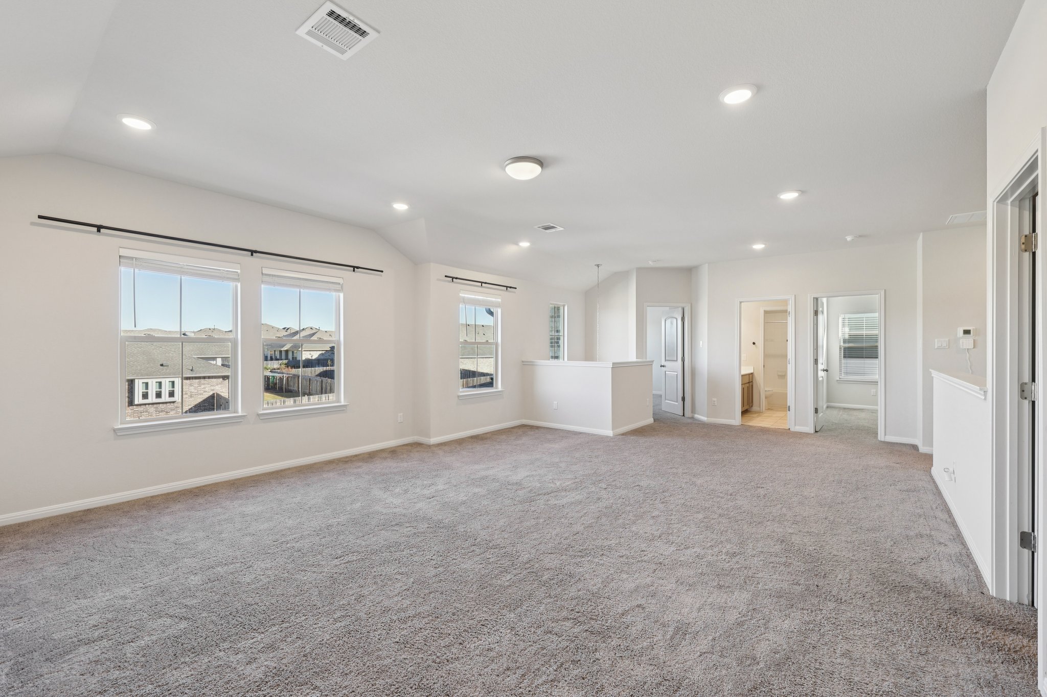308 Castlefields Street Hutto, TX 78634 - Photo 20 of 31 a view of an empty room with a window