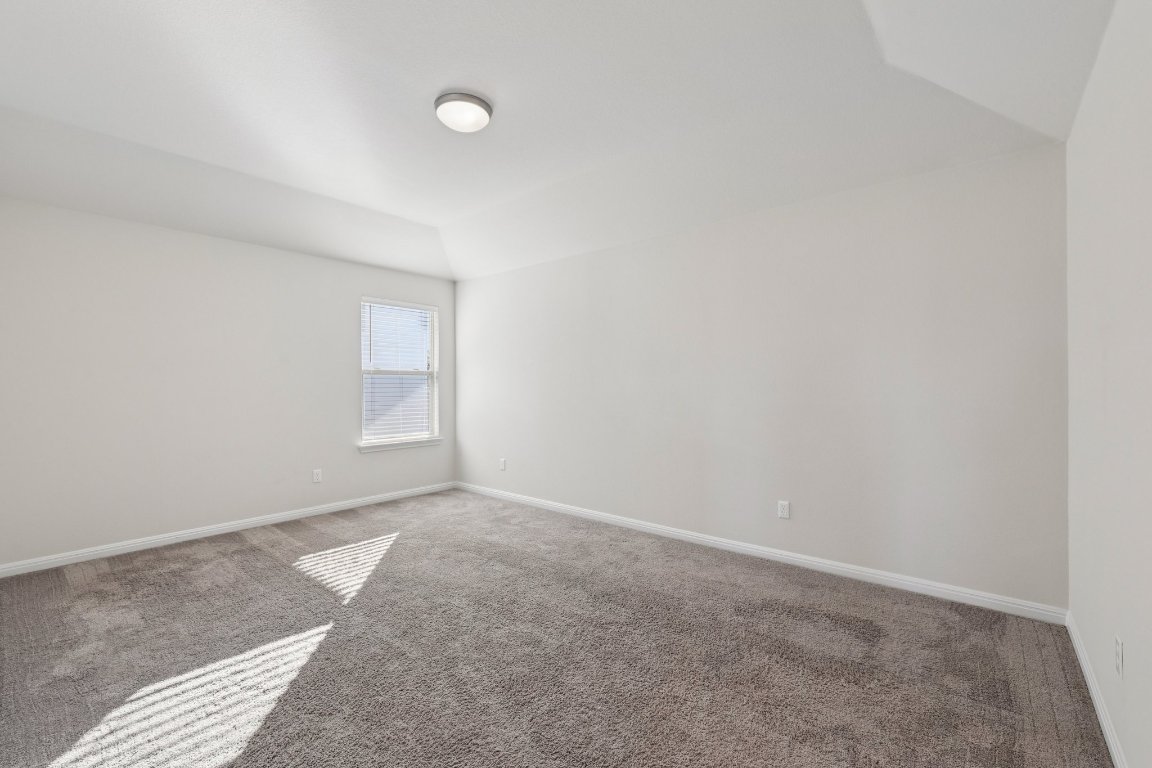 308 Castlefields Street Hutto, TX 78634 - Photo 21 of 31 a view of an empty room and window