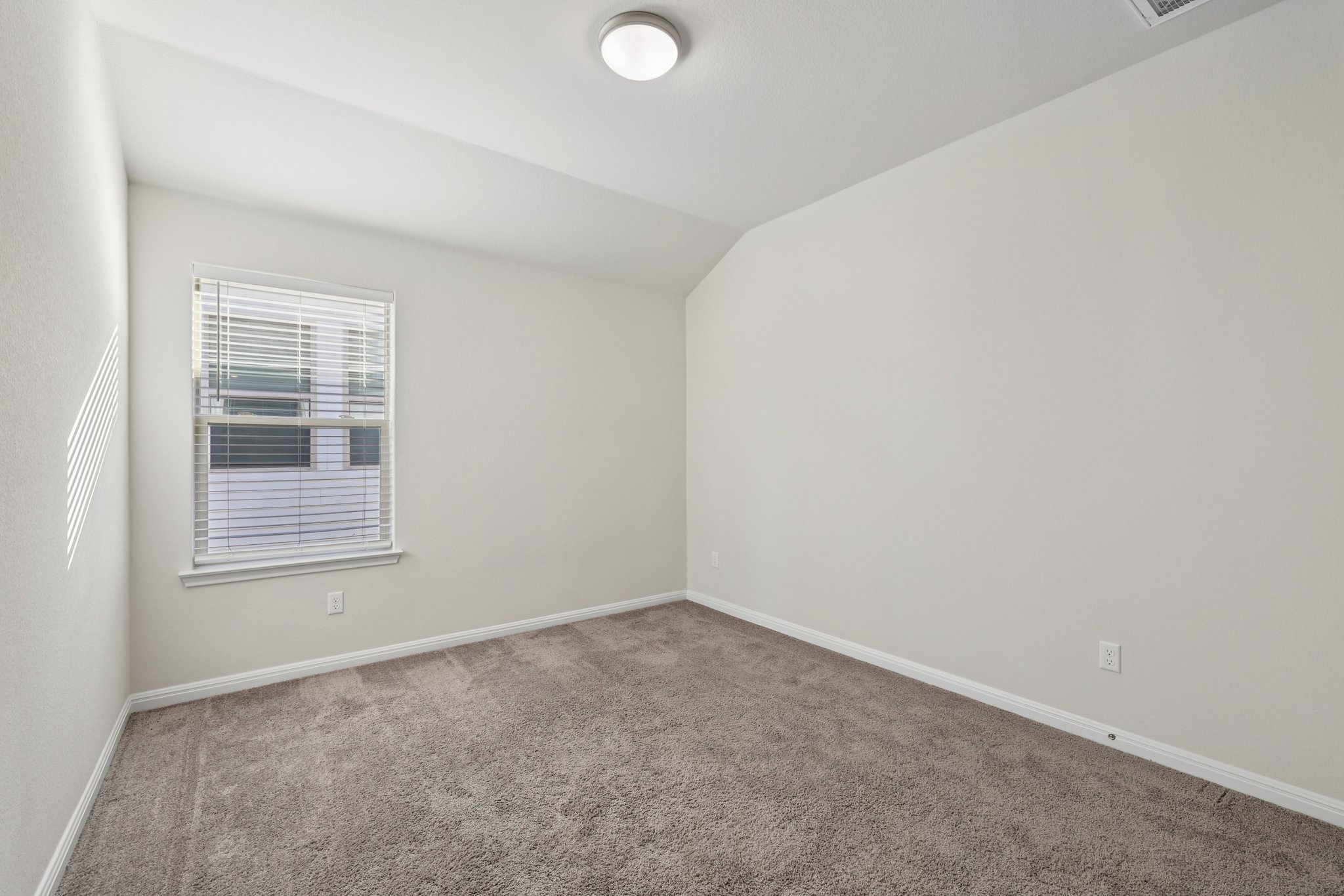 308 Castlefields Street Hutto, TX 78634 - Photo 23 of 31 an empty room with a window