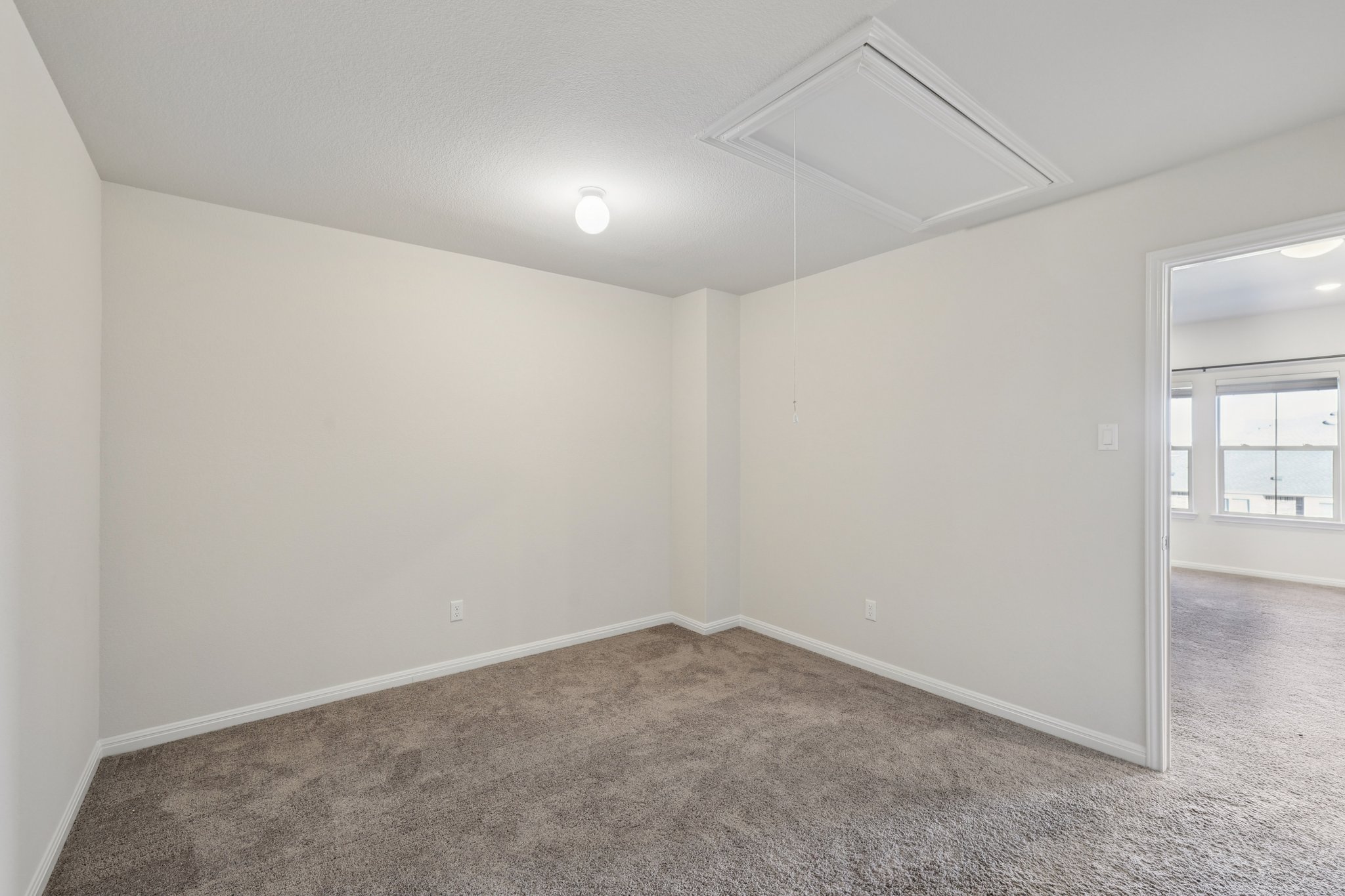 308 Castlefields Street Hutto, TX 78634 - Photo 27 of 31 an empty room with windows