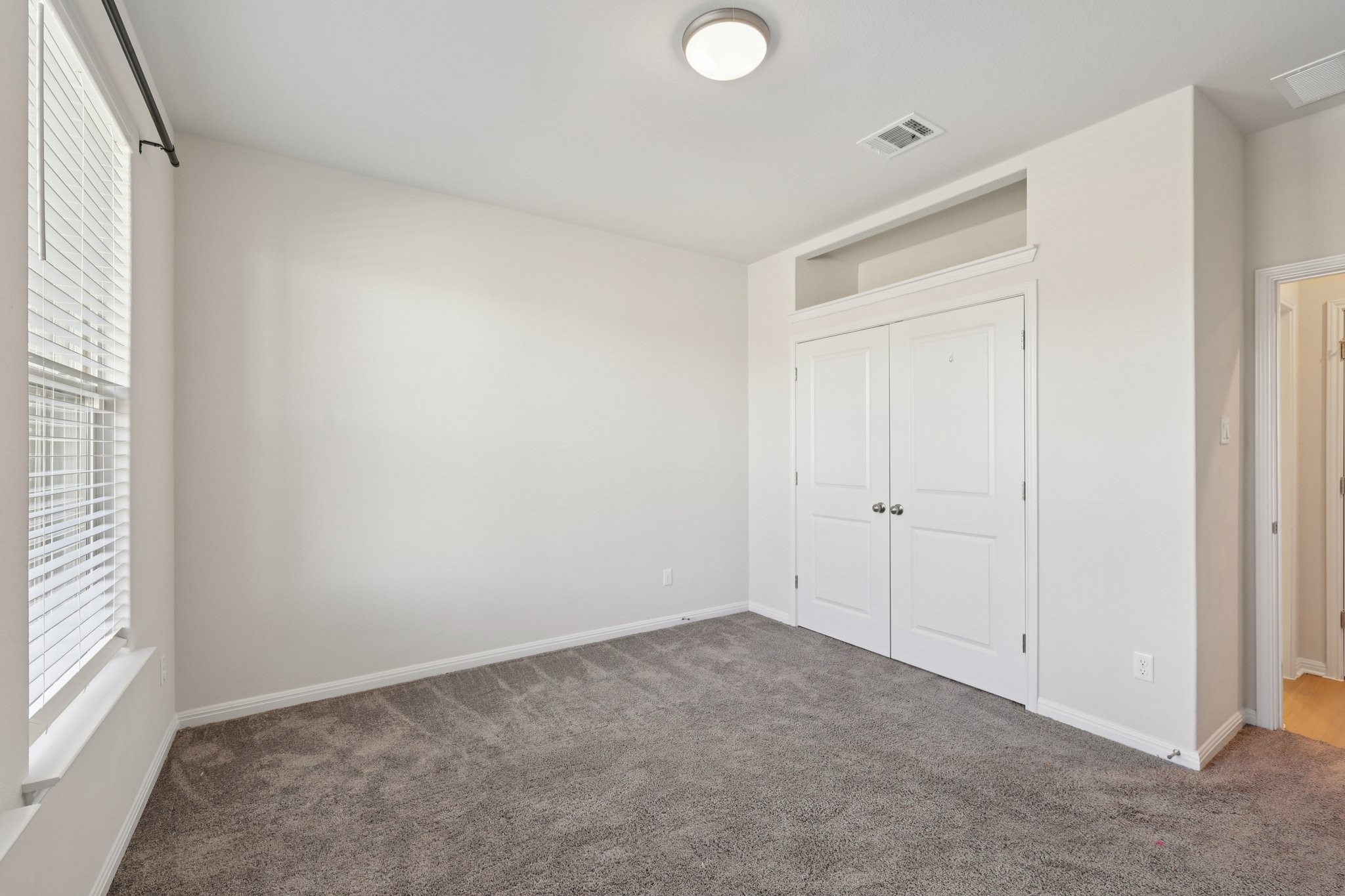 308 Castlefields Street Hutto, TX 78634 - Photo 9 of 31 a view of an empty room and window