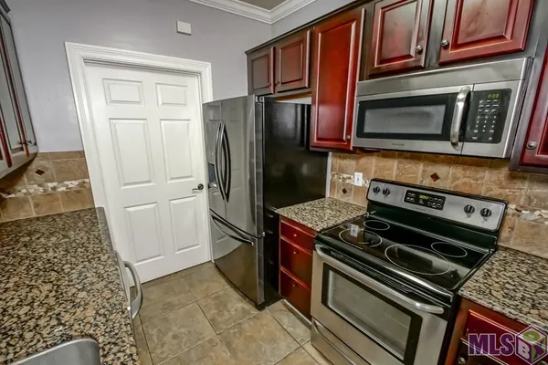 $179,900 | 12430 River Highlands Drive, Unit V, St. Amant, LA 70774