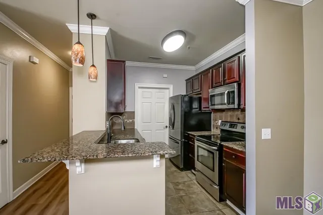 $179,900 | 12430 River Highlands Drive, Unit V, St. Amant, LA 70774