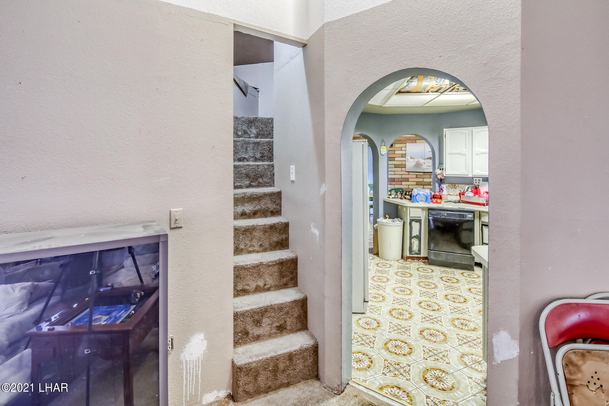 4062 Lakeview Road Lake Havasu City, AZ 86406 - Photo 25 of 40 Staircase to playroom or extra storage
