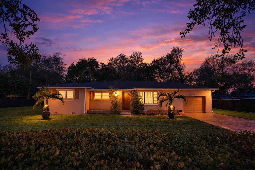 a view of swimming pool with a yard