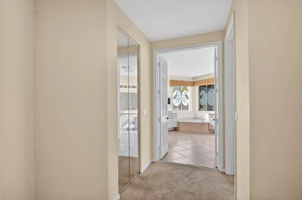 a view of a park with iron fence