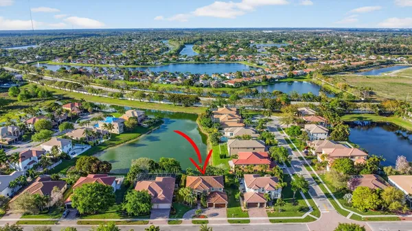 $975,000 | 9599 Campi Drive, Lake Worth, FL 33467