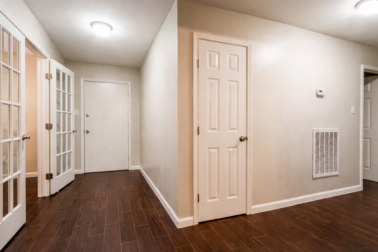584 Elm Street Prairie View, TX 77484 - Photo 3 of 13 a view of a hallway with wooden floor and closet area