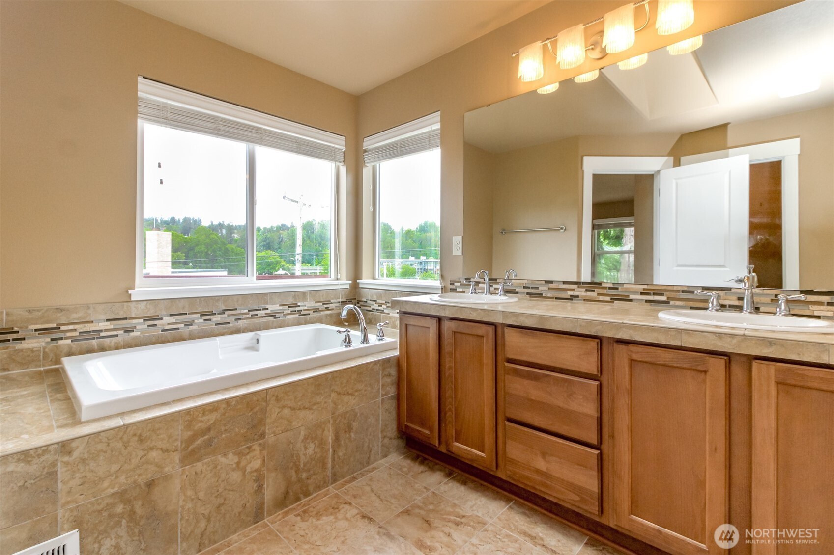 3000 South Mt Baker Boulevard Seattle, WA 98144 - Photo 23 of 40 a spacious bathroom with a large tub and sink