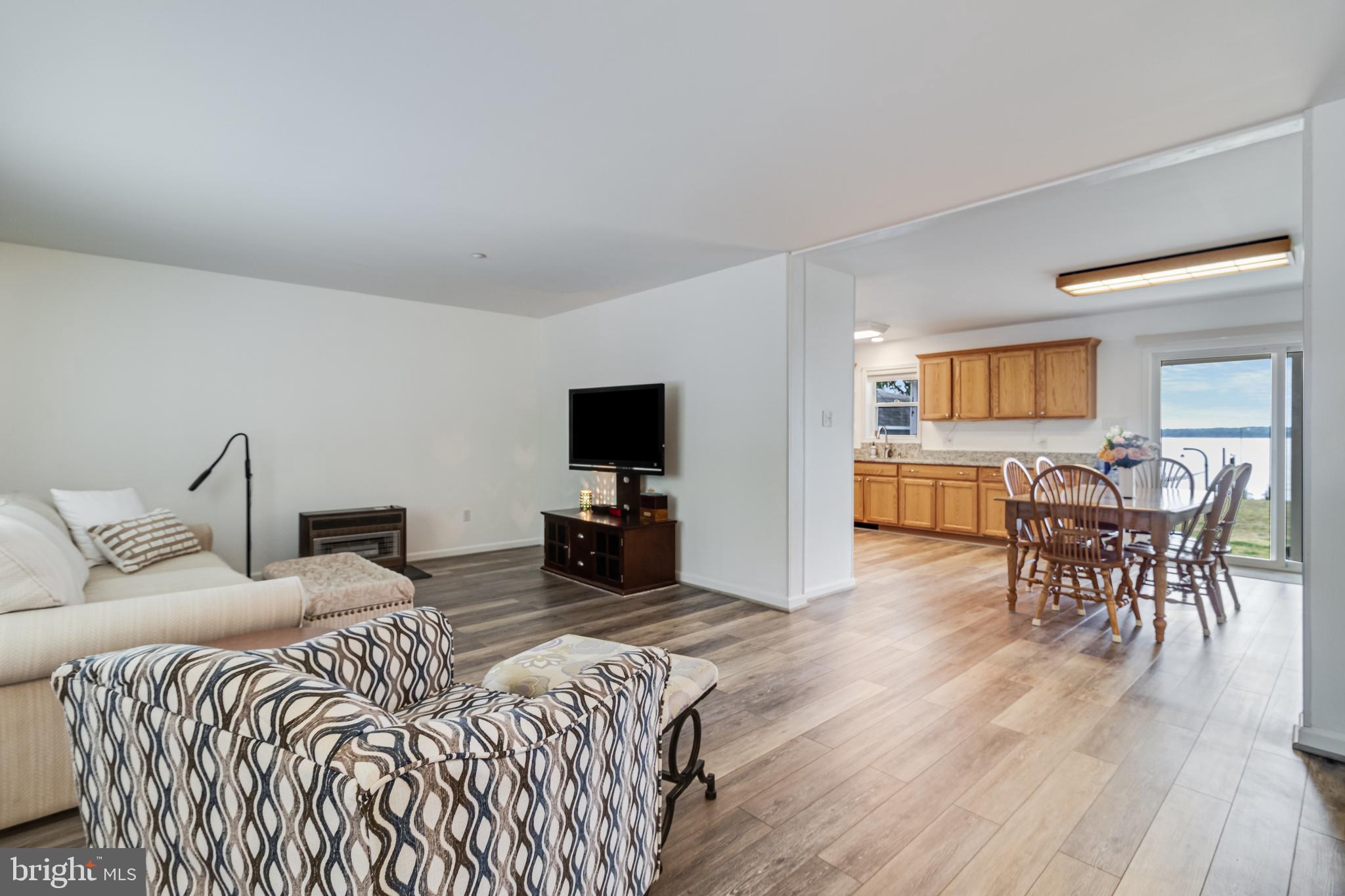 12015 Woodbury Road Nanjemoy, MD 20662 - Photo 17 of 53 a bedroom with two beds and a flat screen tv