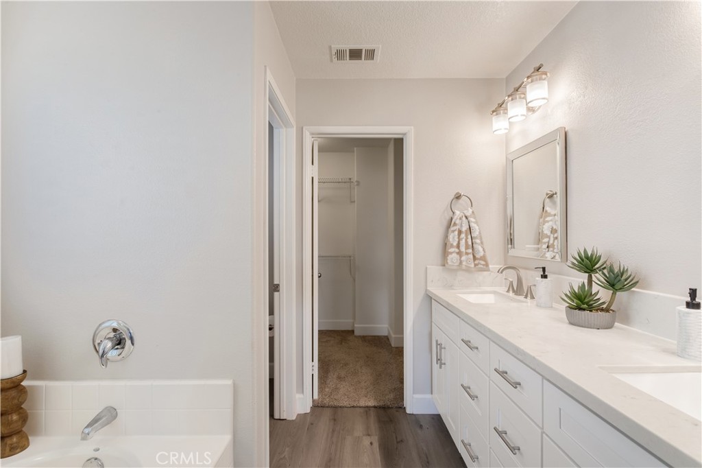 40116 Stowe Road Temecula, CA 92591 - Photo 28 of 53 Large Walk in Closet in Primary Bedroom Suite