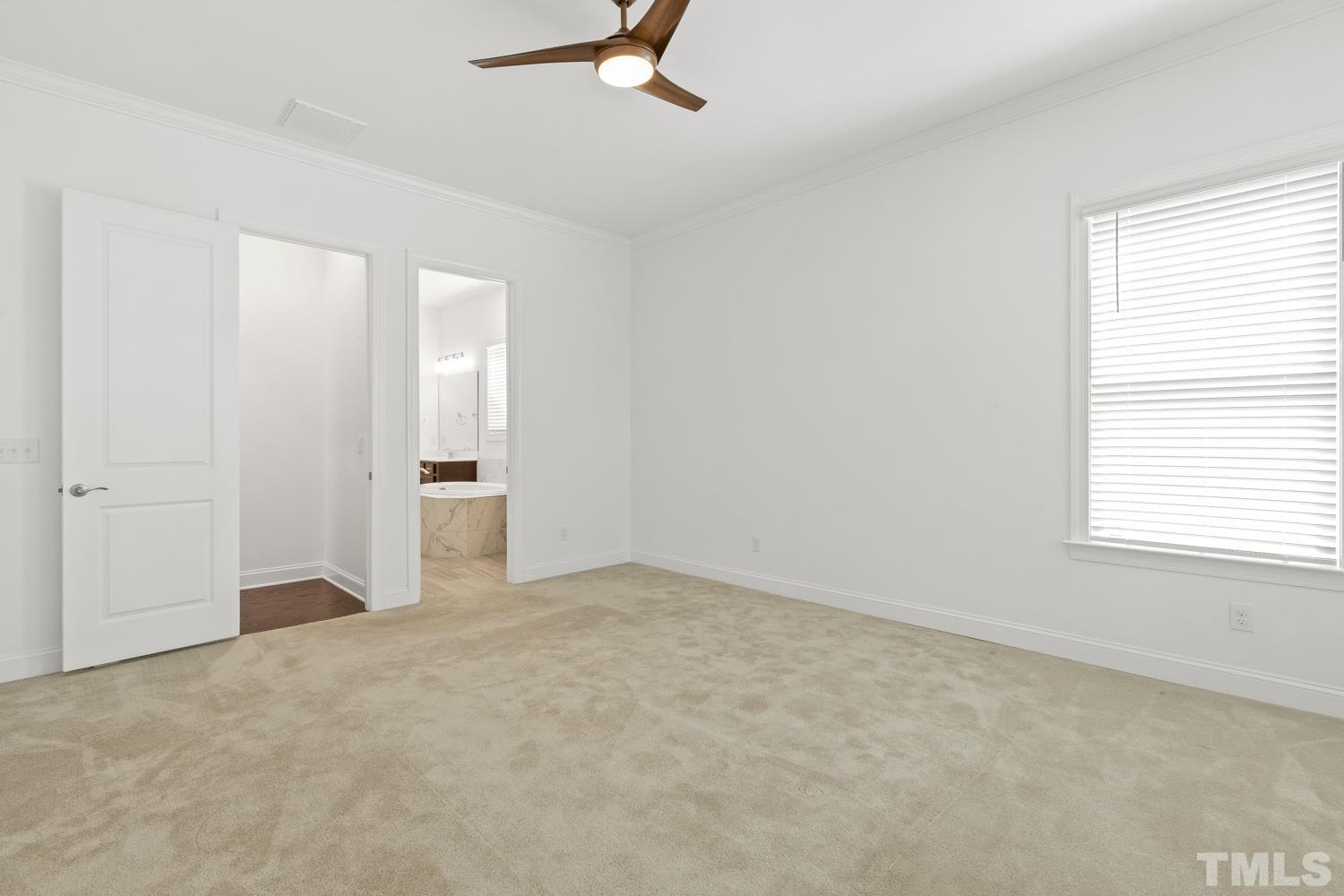 733 Midori Circle Cary, NC 27519 - Photo 21 of 41 an empty room with closet and windows