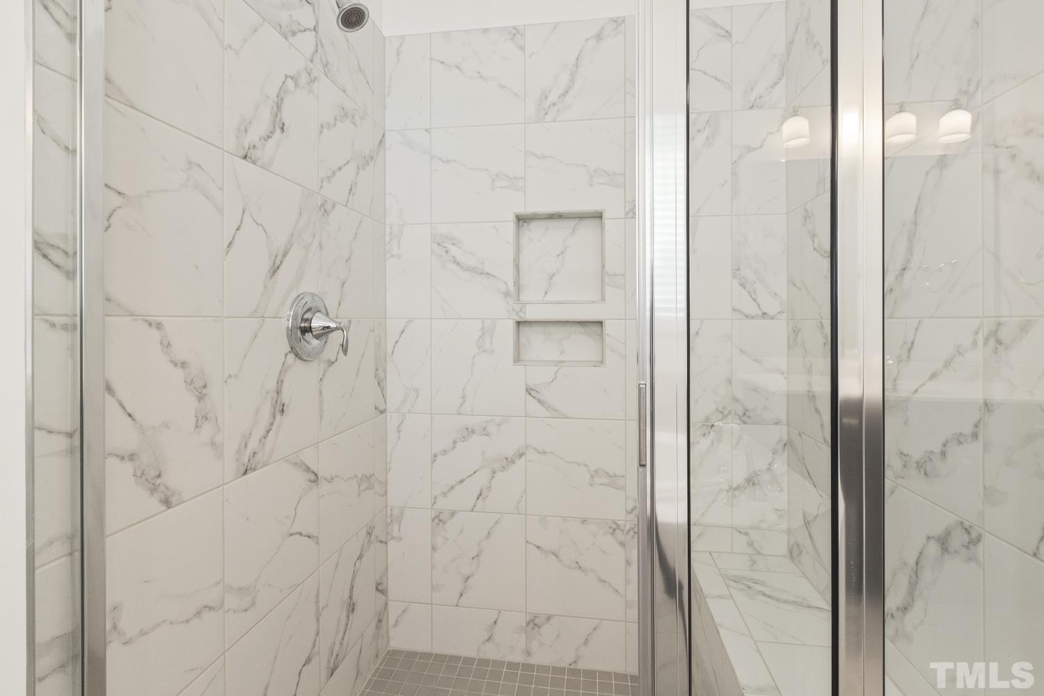 733 Midori Circle Cary, NC 27519 - Photo 25 of 41 a bathroom with a shower