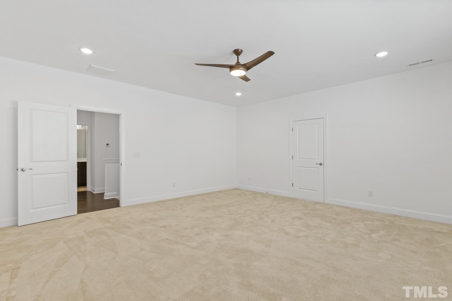 733 Midori Circle Cary, NC 27519 - Photo 31 of 41 an empty room with closet and windows