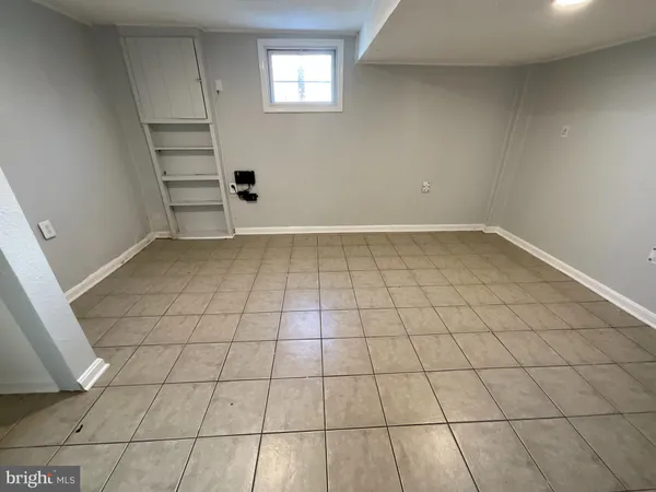 a view of a livingroom and entryway