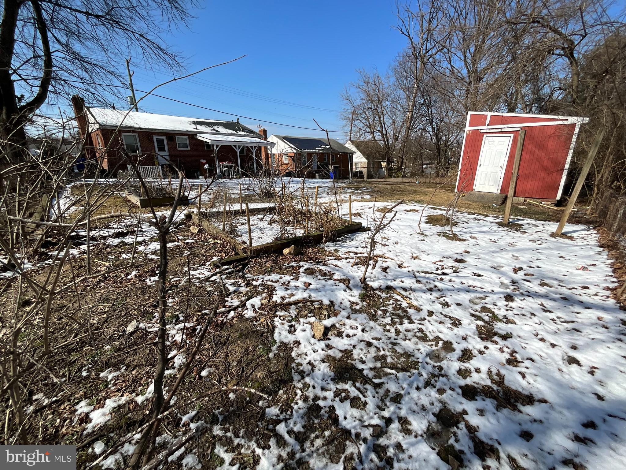 10405 Georgia Avenue Silver Spring, MD 20902 - Photo 3 of 16 a view of a backyard of the house
