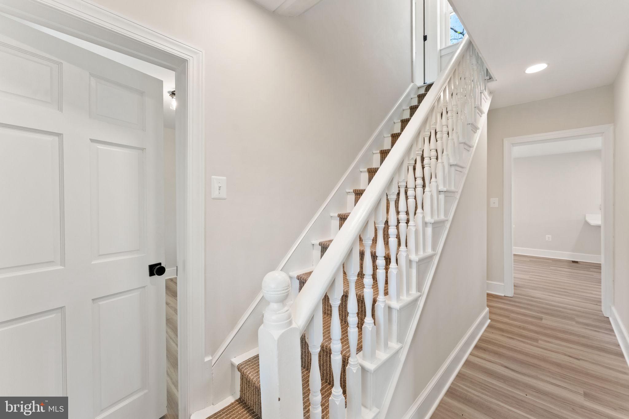 11066 Moreland Road Delaplane, VA 20144 - Photo 16 of 87 a view of staircase with wooden floor and staircase