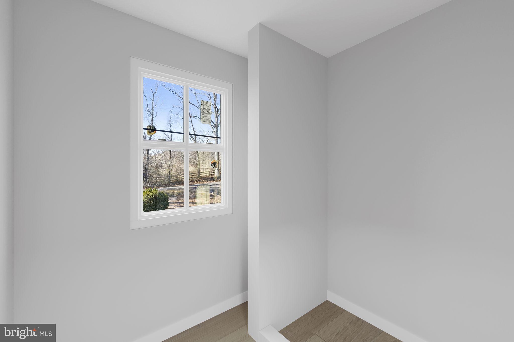 11066 Moreland Road Delaplane, VA 20144 - Photo 21 of 37 a view of an empty room with a window
