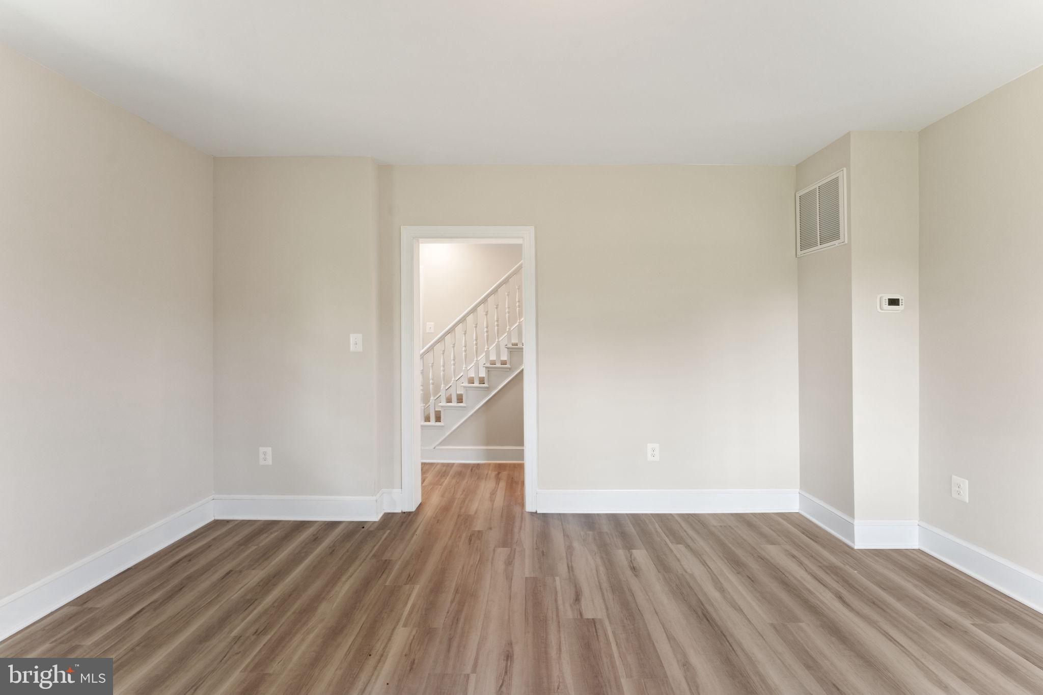 11066 Moreland Road Delaplane, VA 20144 - Photo 21 of 87 a view of an empty room and wooden floor