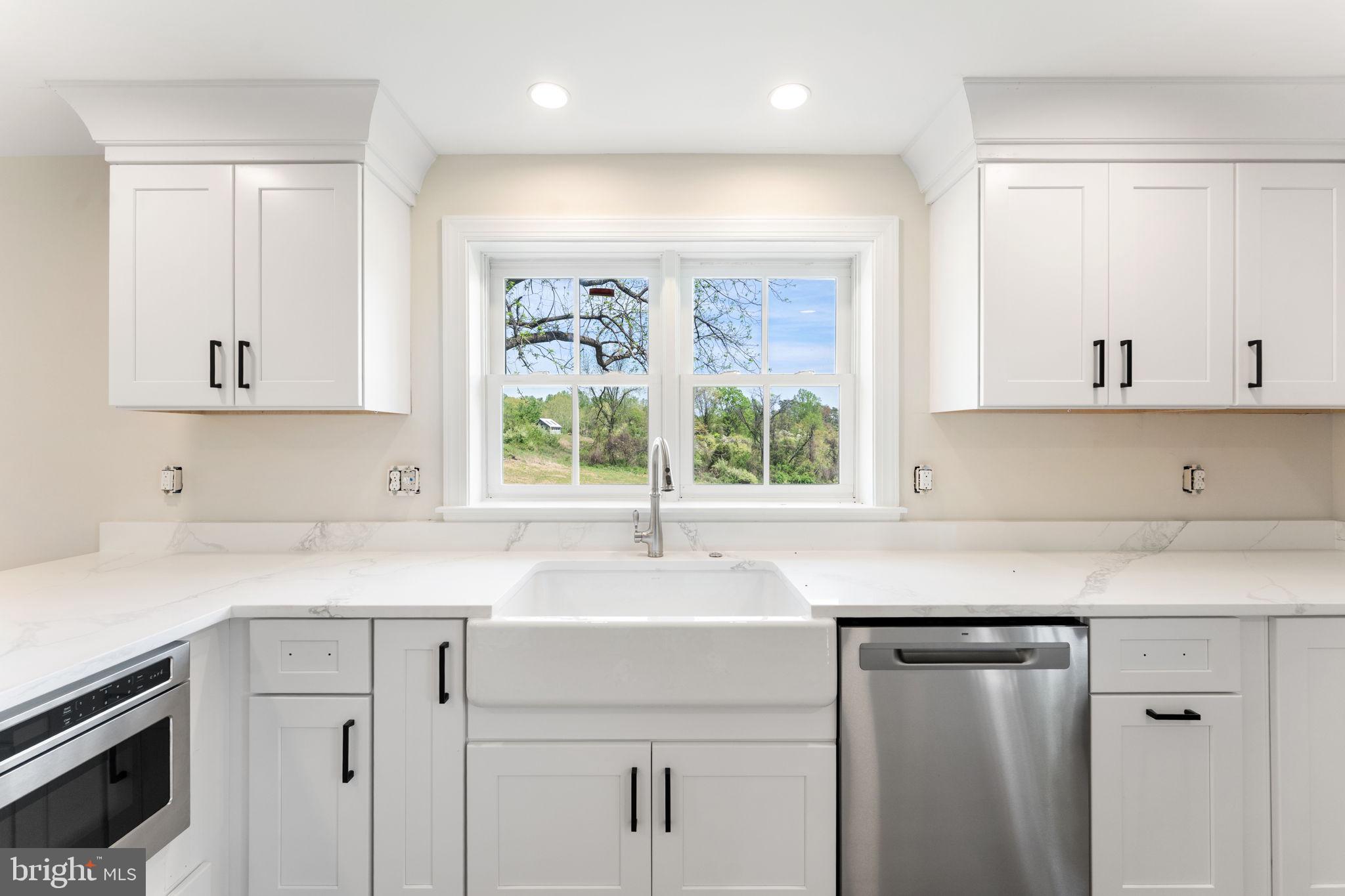 11066 Moreland Road Delaplane, VA 20144 - Photo 31 of 87 a kitchen with a sink cabinets and window